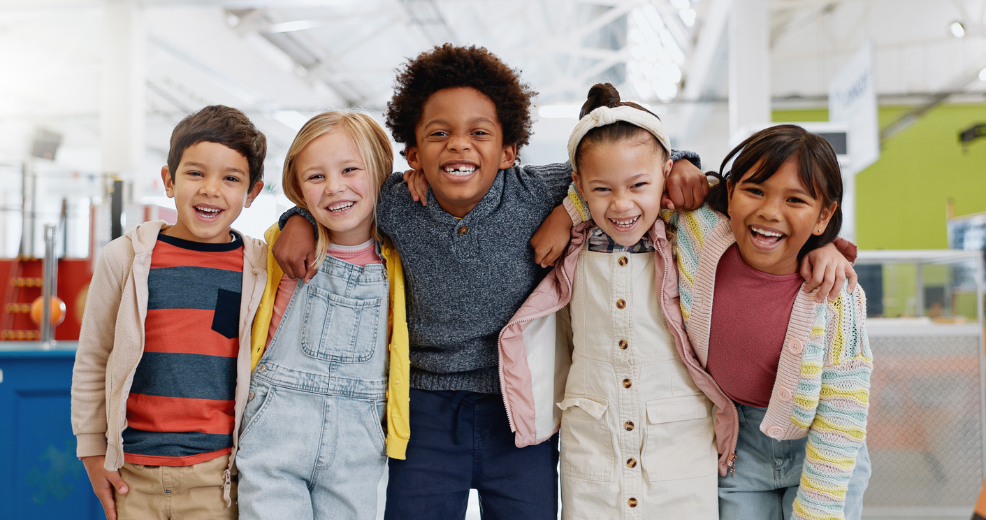 A group of multicultural smiling children.